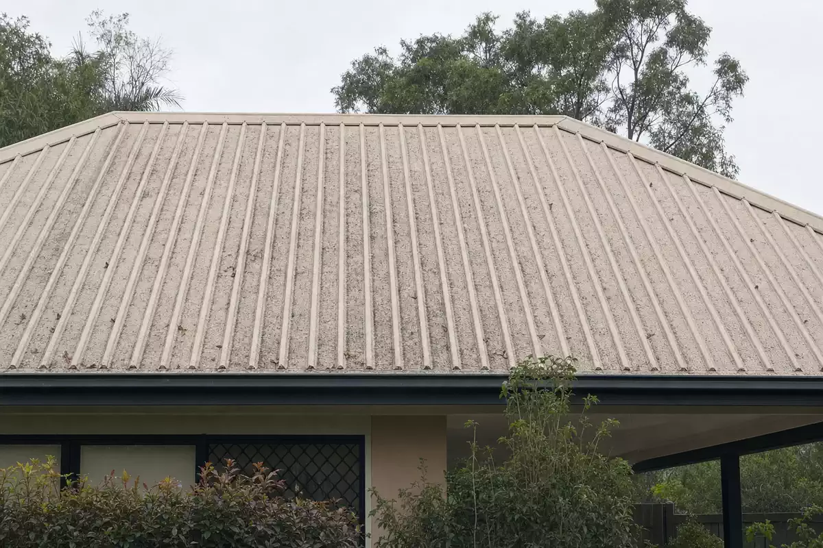 Illustration of a colorbond metal roof before a professional clean